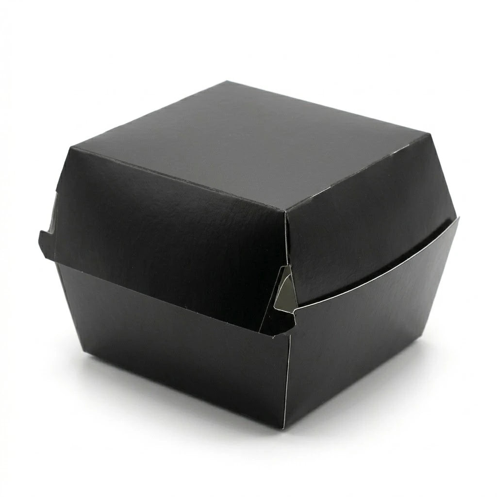 The Black Clamshell Burger Box 4" (200 Pack) is displayed closed on a white background, showcasing its sleek black design for stylish takeaway packaging.