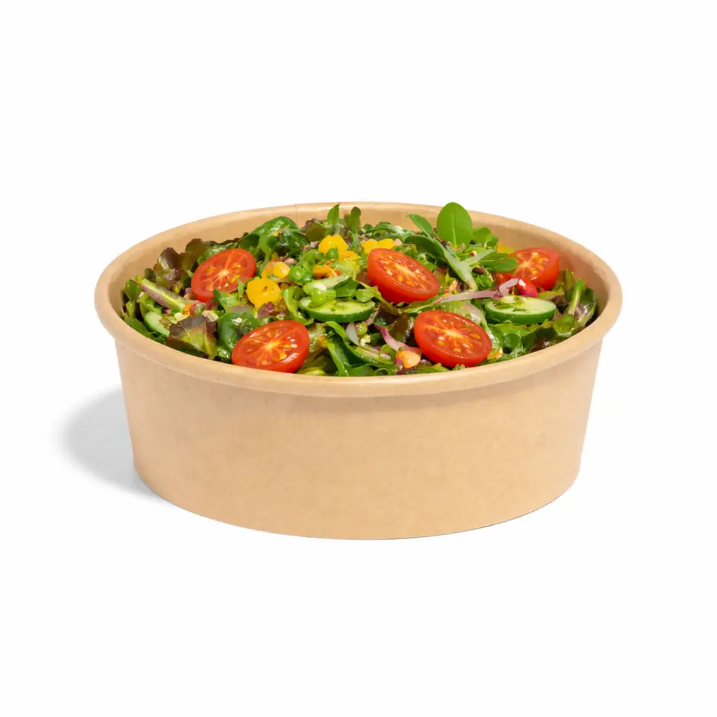 The Kraft Paper Bowl 500ml 300 Pack is ideal for takeaway, shown here filled with mixed green salad, cherry tomatoes, yellow bell pepper, and cucumber slices on a white background.