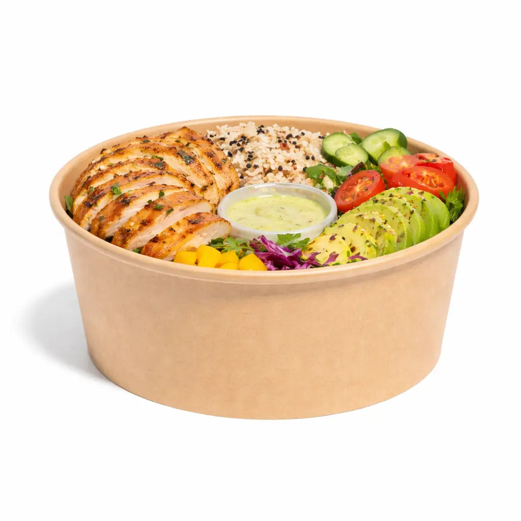 The Kraft Paper Bowl 750ml 300 Pack is ideal for takeaway food like grilled chicken, rice, avocado, cherry tomatoes, cucumber, mango, greens, and dressing—perfect for serving fresh meals or salads on the go.