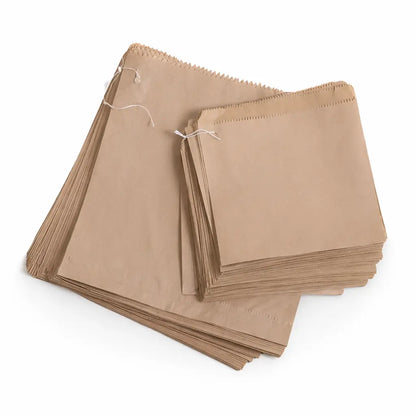 A stack of Brown Paper Bags 12" x 12" (1000 Pack) arranged on a white surface, ideal for takeaway food packaging.