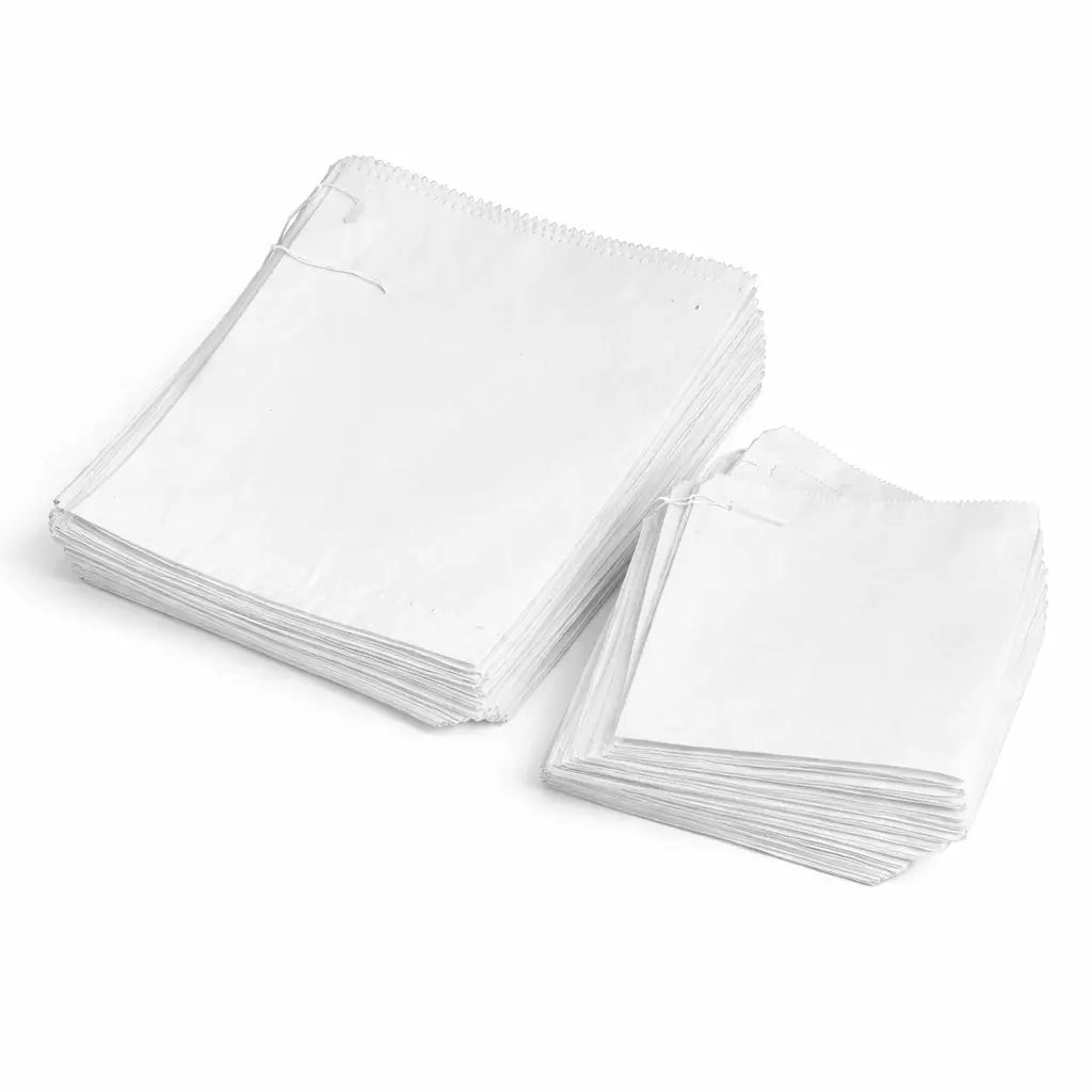 A pack of 900 White Greaseproof Paper Bags, 8.5" size, displayed on a white background—perfect for takeaway food packaging.