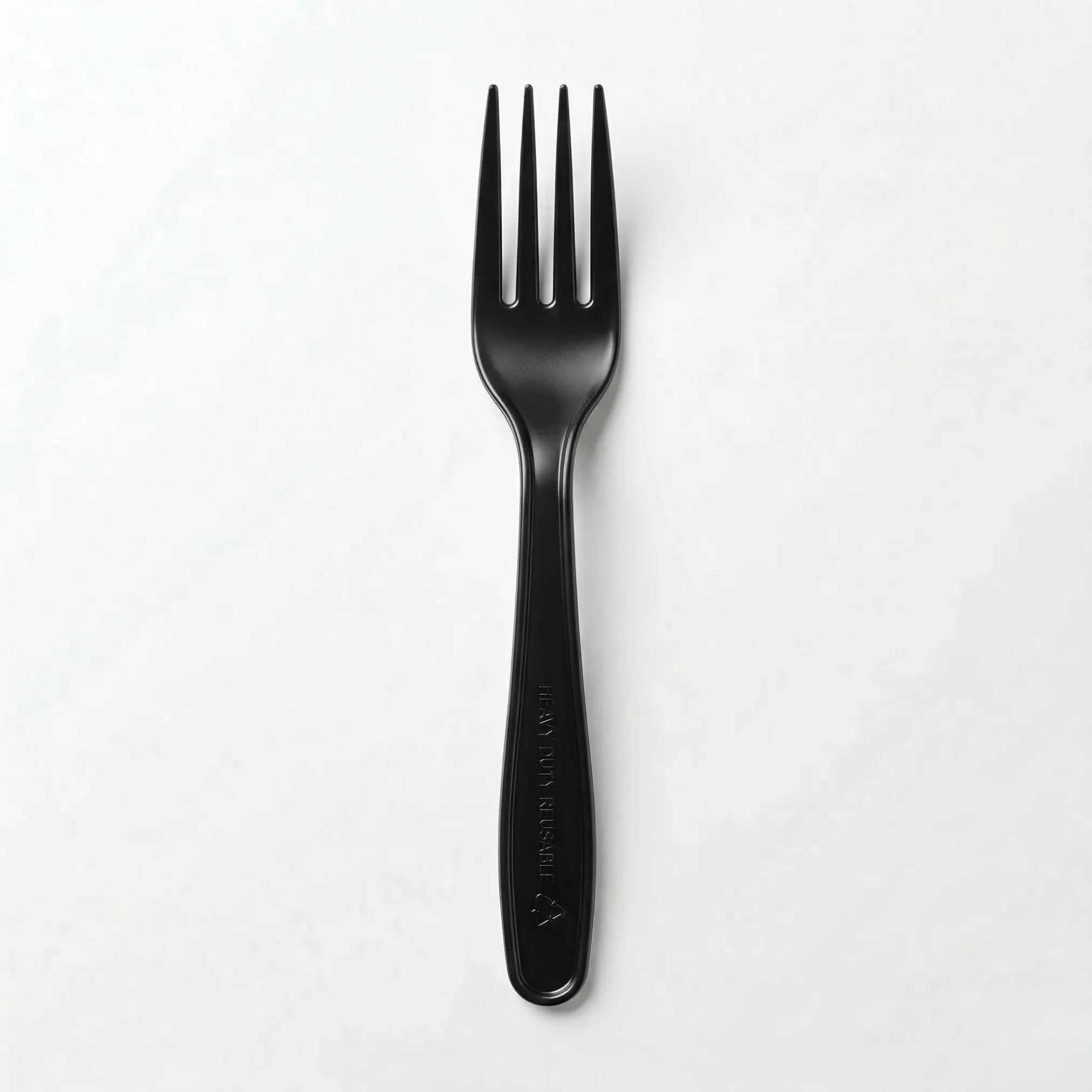 A single fork from the Black Plastic Forks 1000 Pack, commonly used as disposable cutlery for takeaway meals, stands upright on a plain white surface.